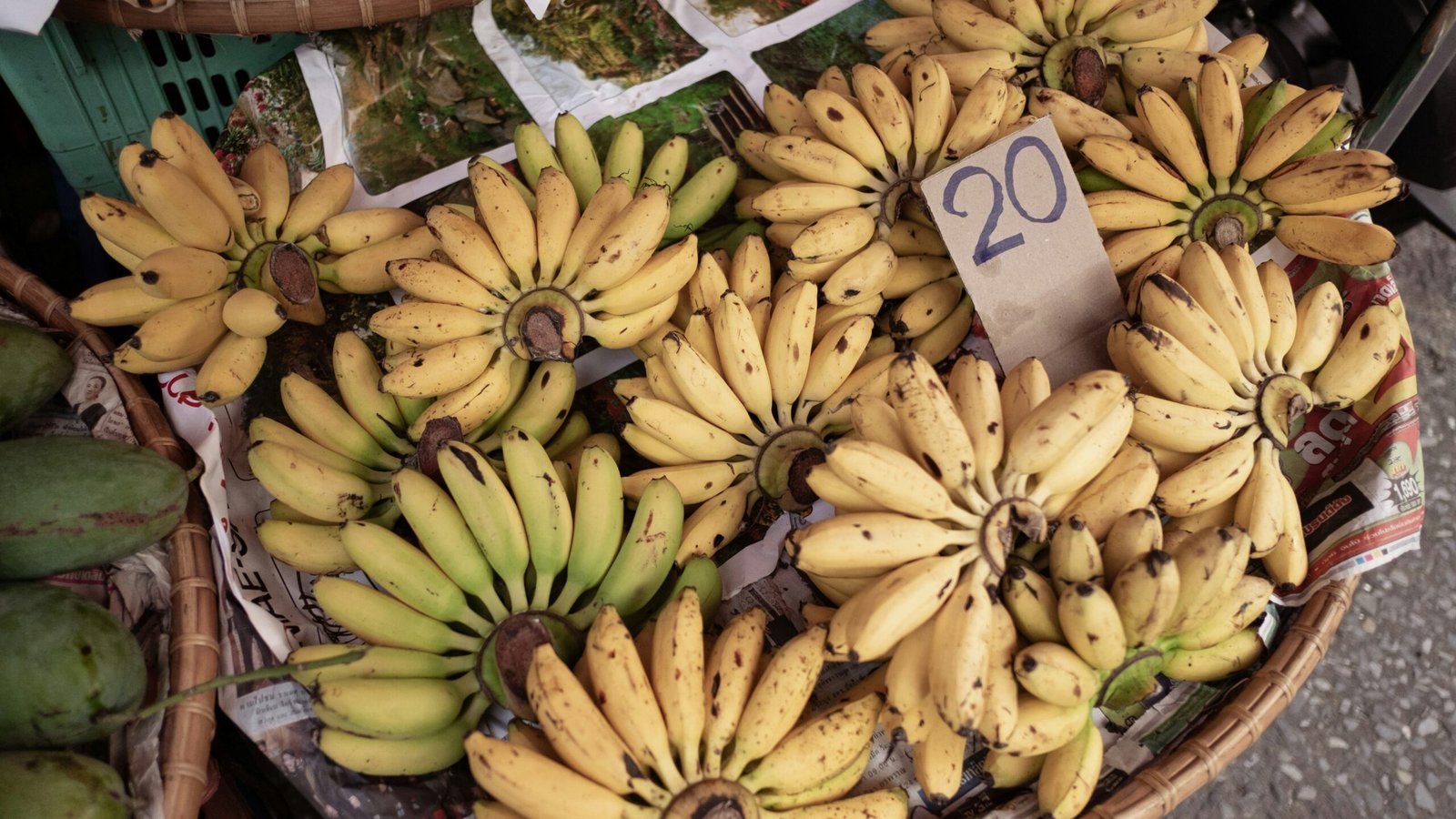 yellow banana fruit on white paper